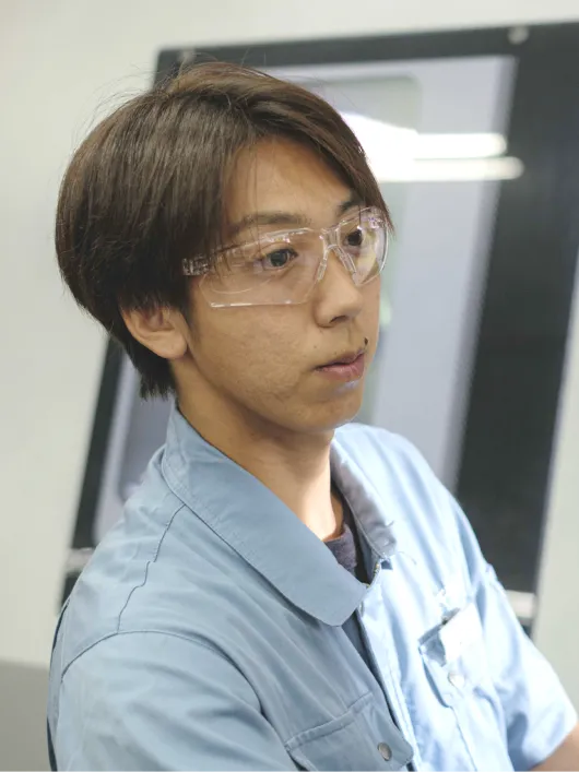 製品を機械で検査している様子の写真